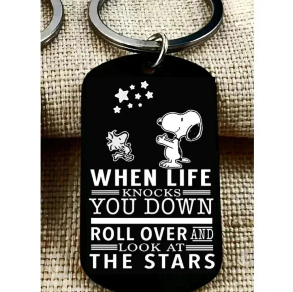 Snoopy roll over and look at the Star Hot Keychain